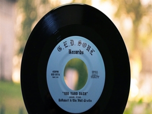 12in - 100 Yard Dash/It's All the Time - Derobert & the Half-Truths